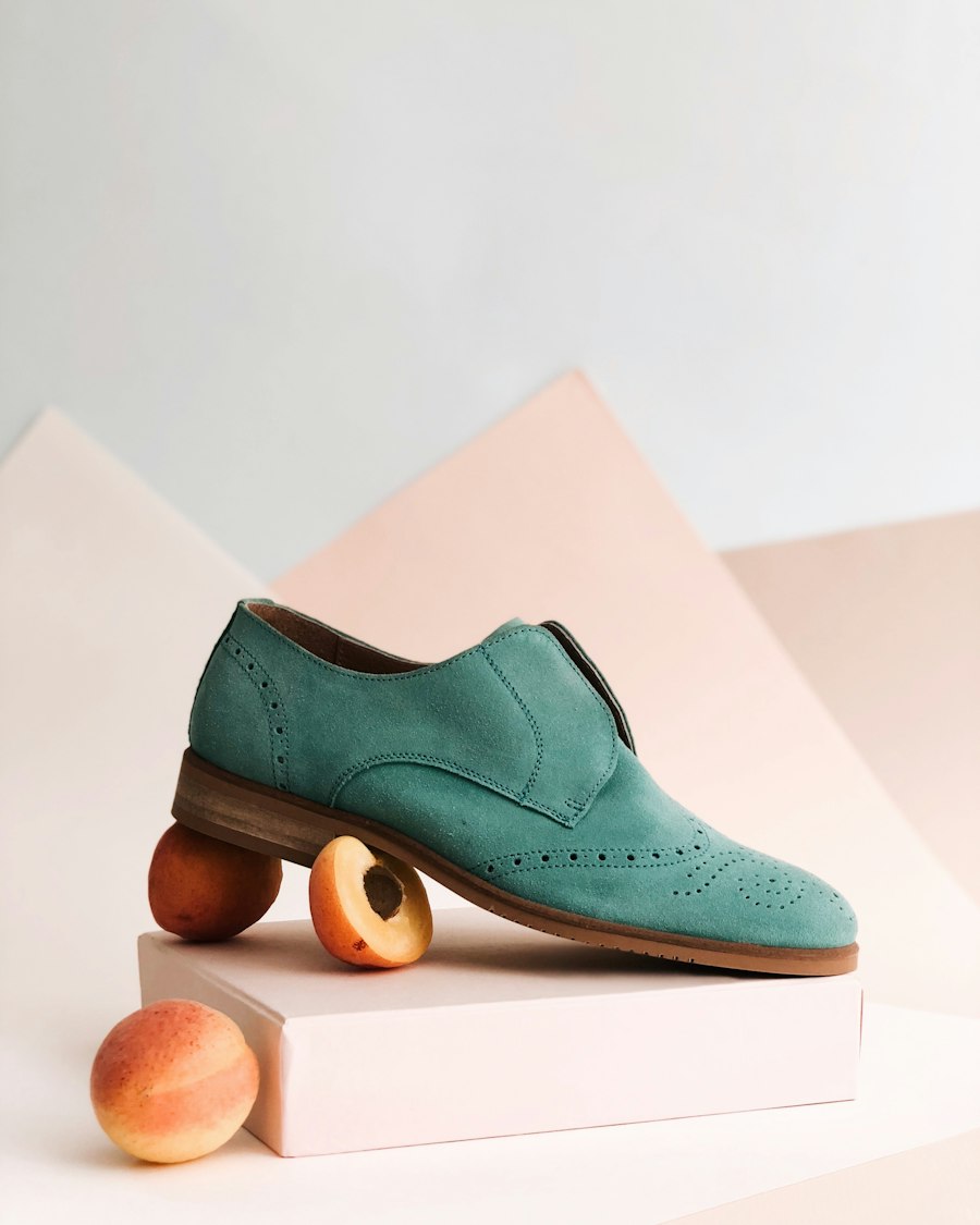 Teal suede brogue shoe with perforated detailing