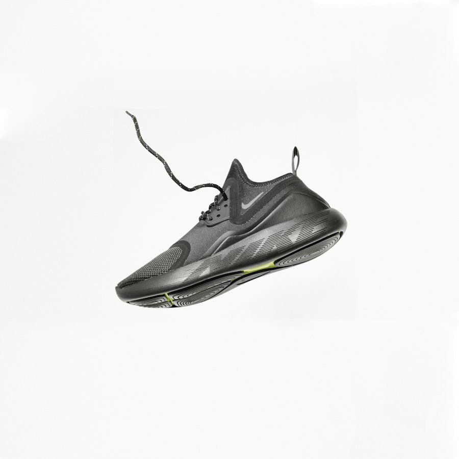 Black knit Nike running sneaker in profile